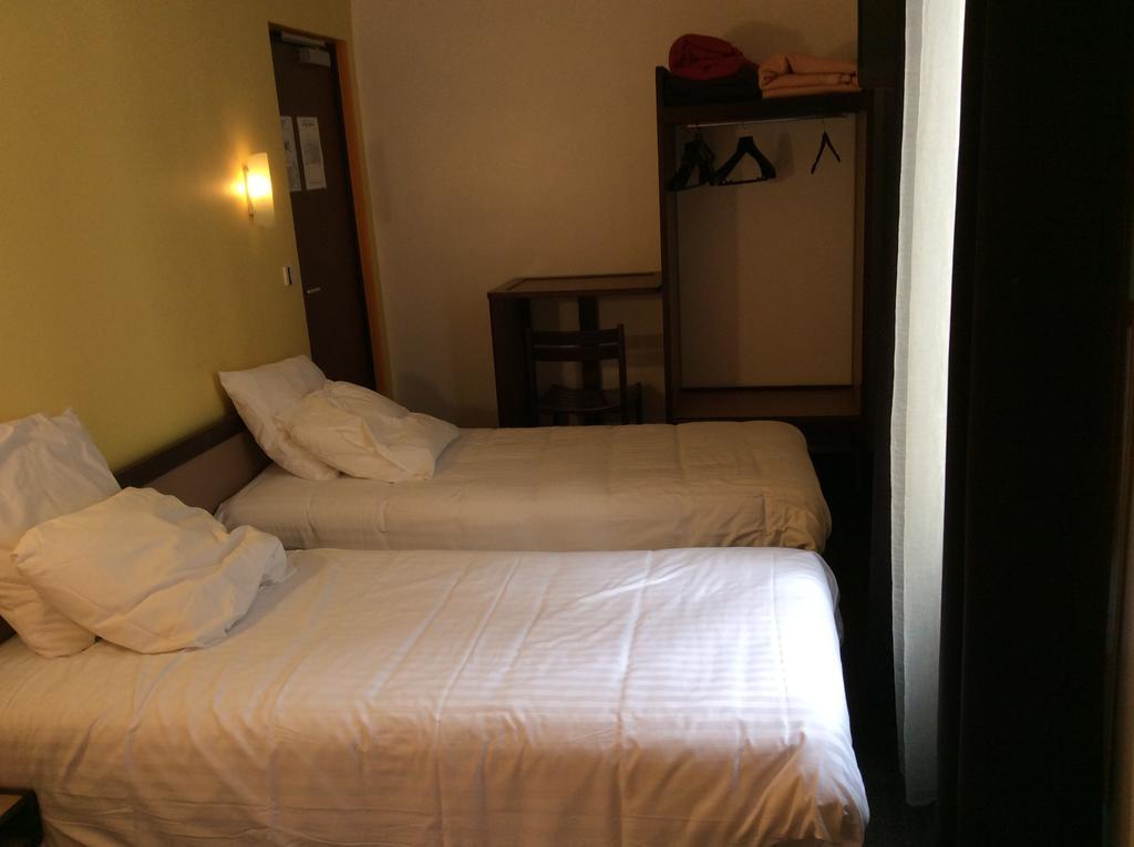 Hotel De La Place Malakoff Quarto foto